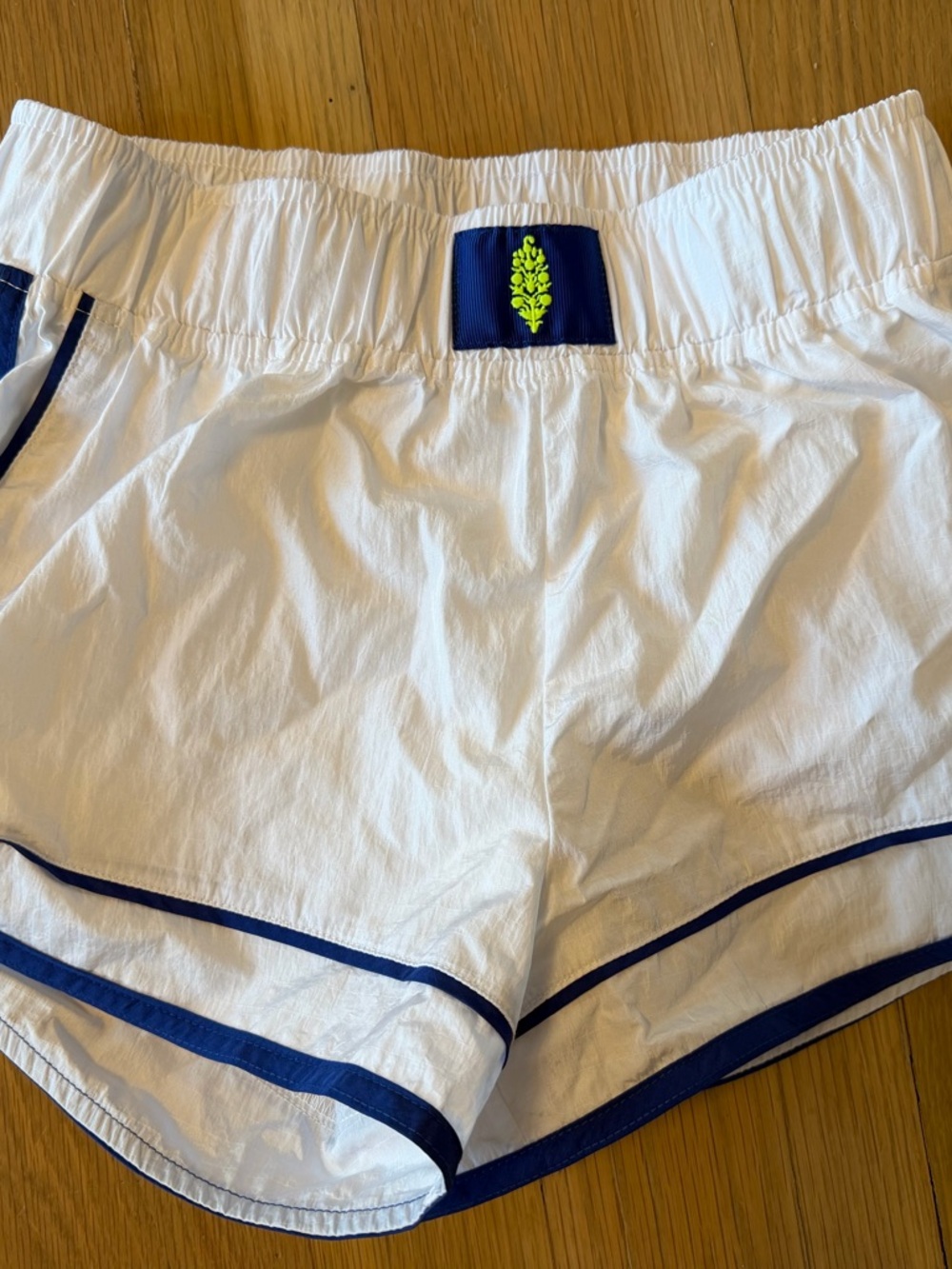 Free People Athletic Shorts NWOT with Navy Trim and Neon Leaf Patch- authentic